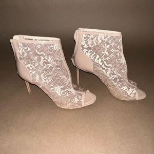 NICHOLAS KIRKWOOD Lace peep toe booties.